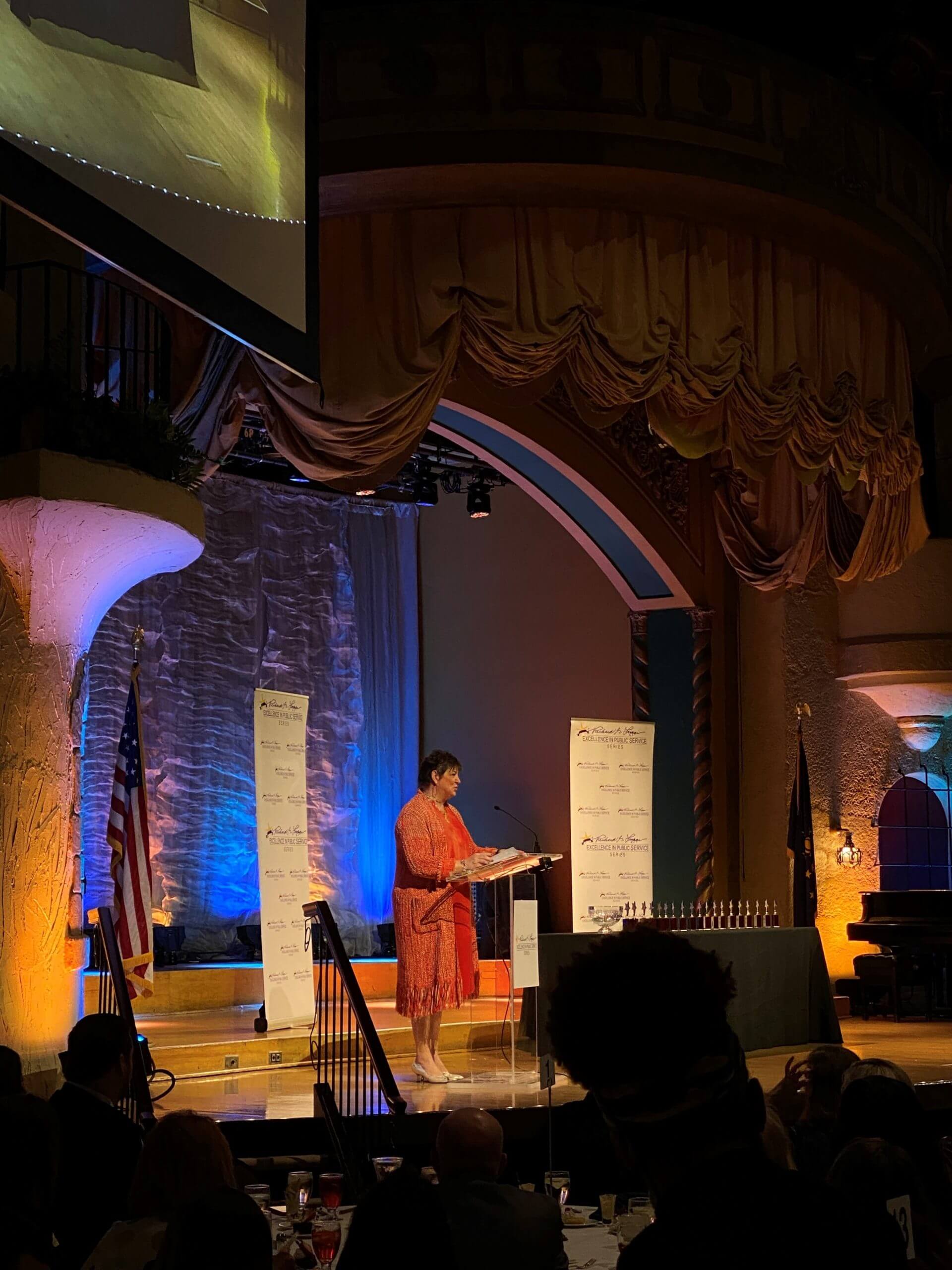 A speaker addresses event attendees