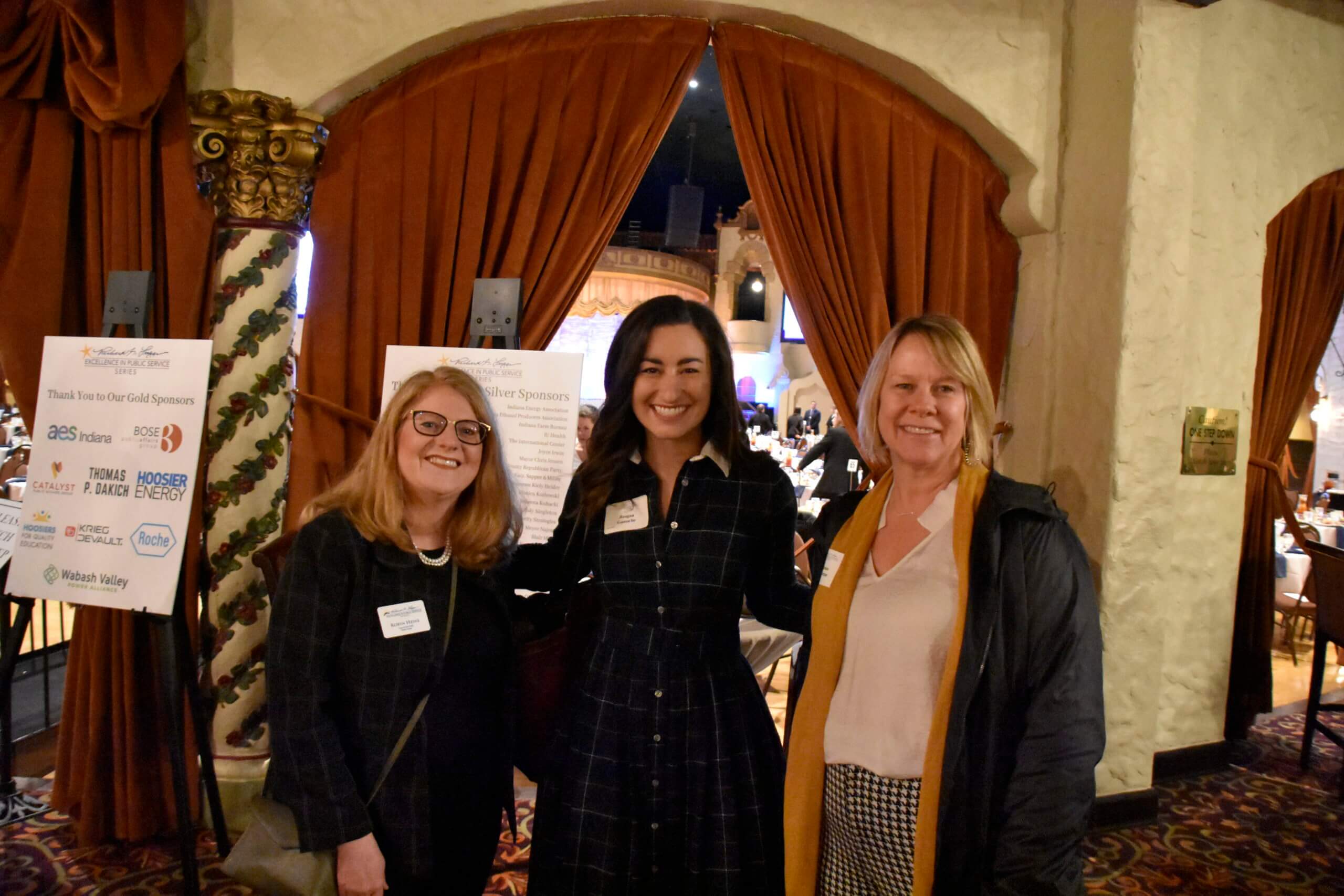 Event attendees pose for a picture