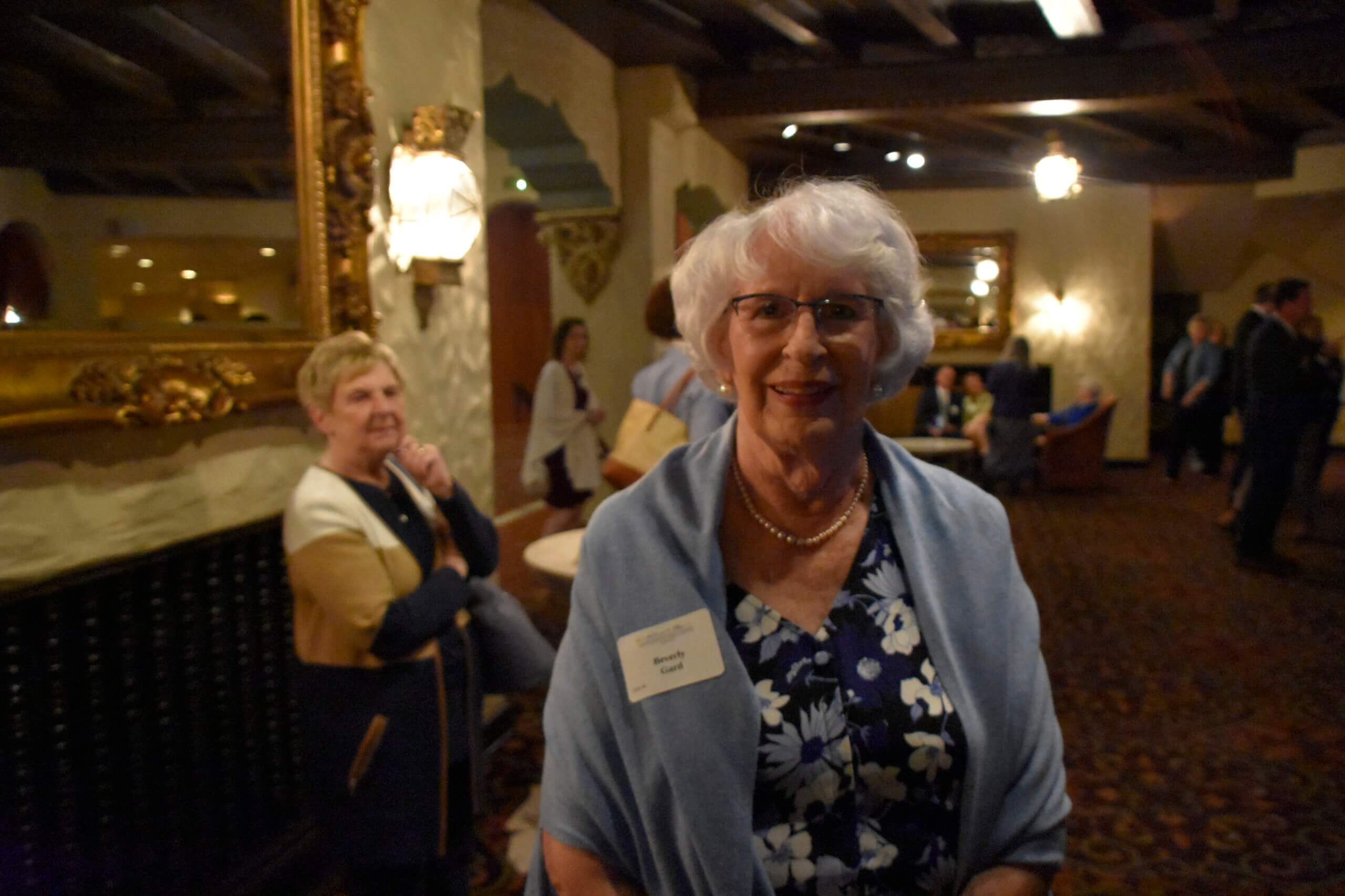 A woman smiles at the Lugar Series event