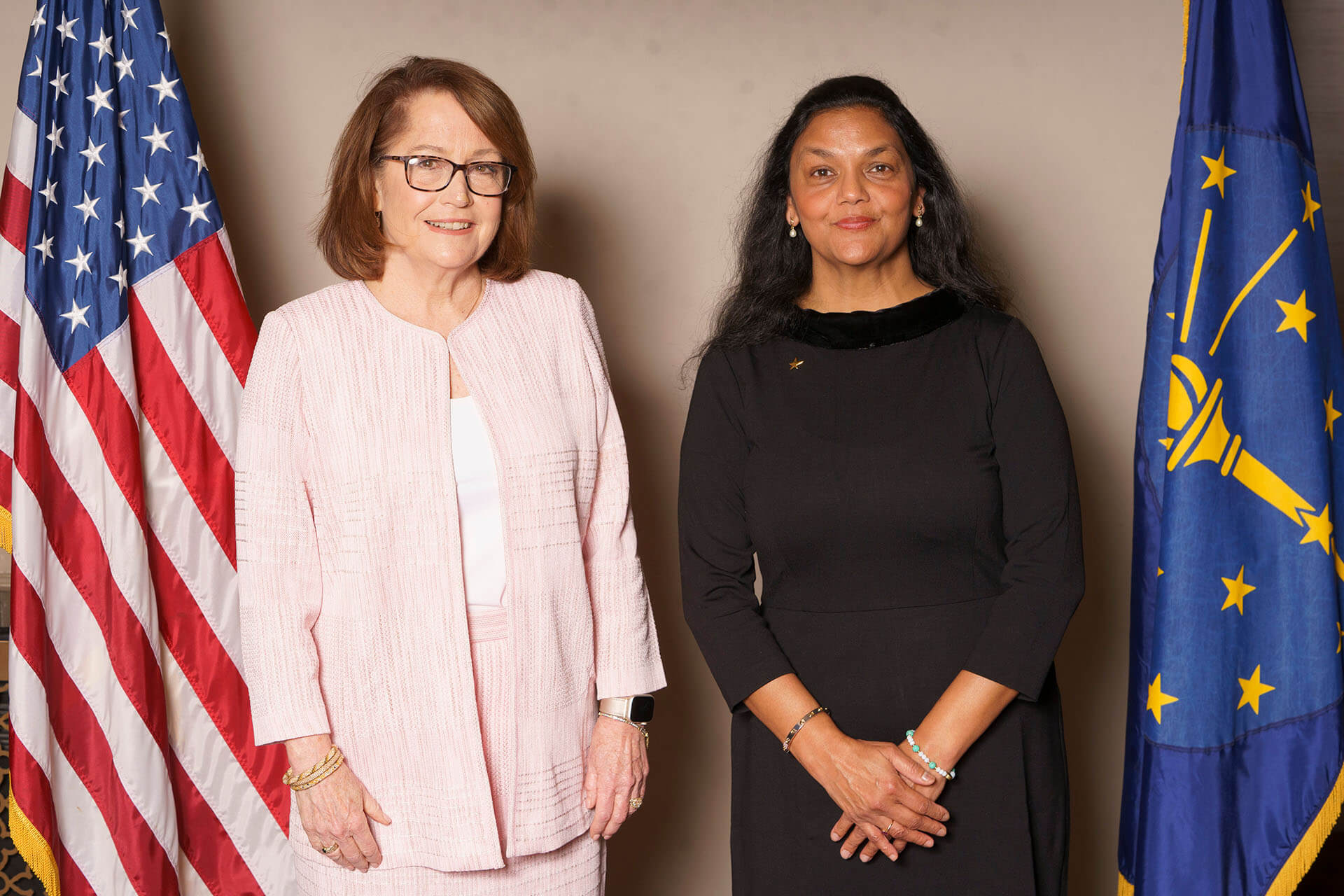 Annual Luncheon photo of Lugar Series members with flags