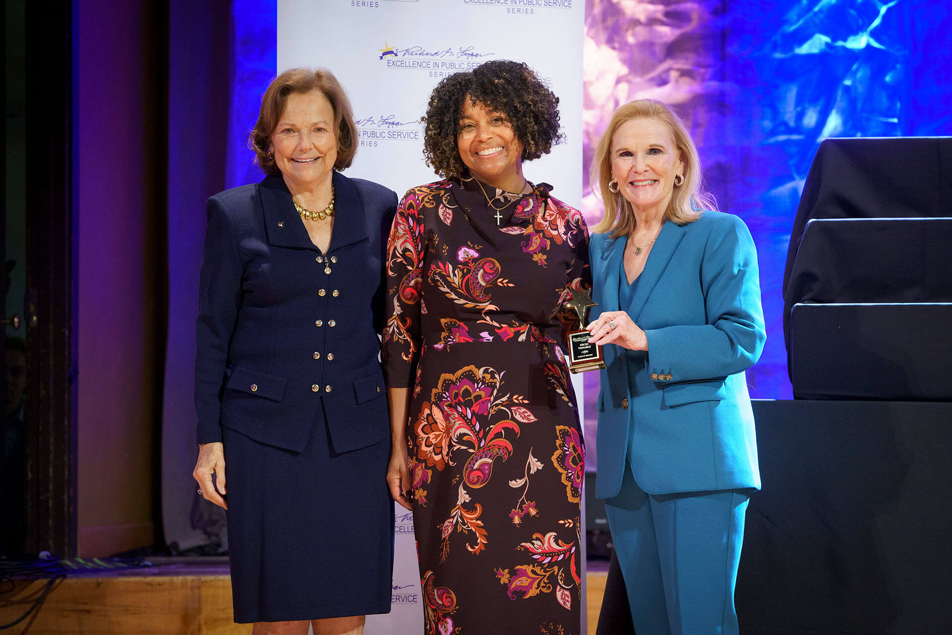 Lugar Series member is presented with an award