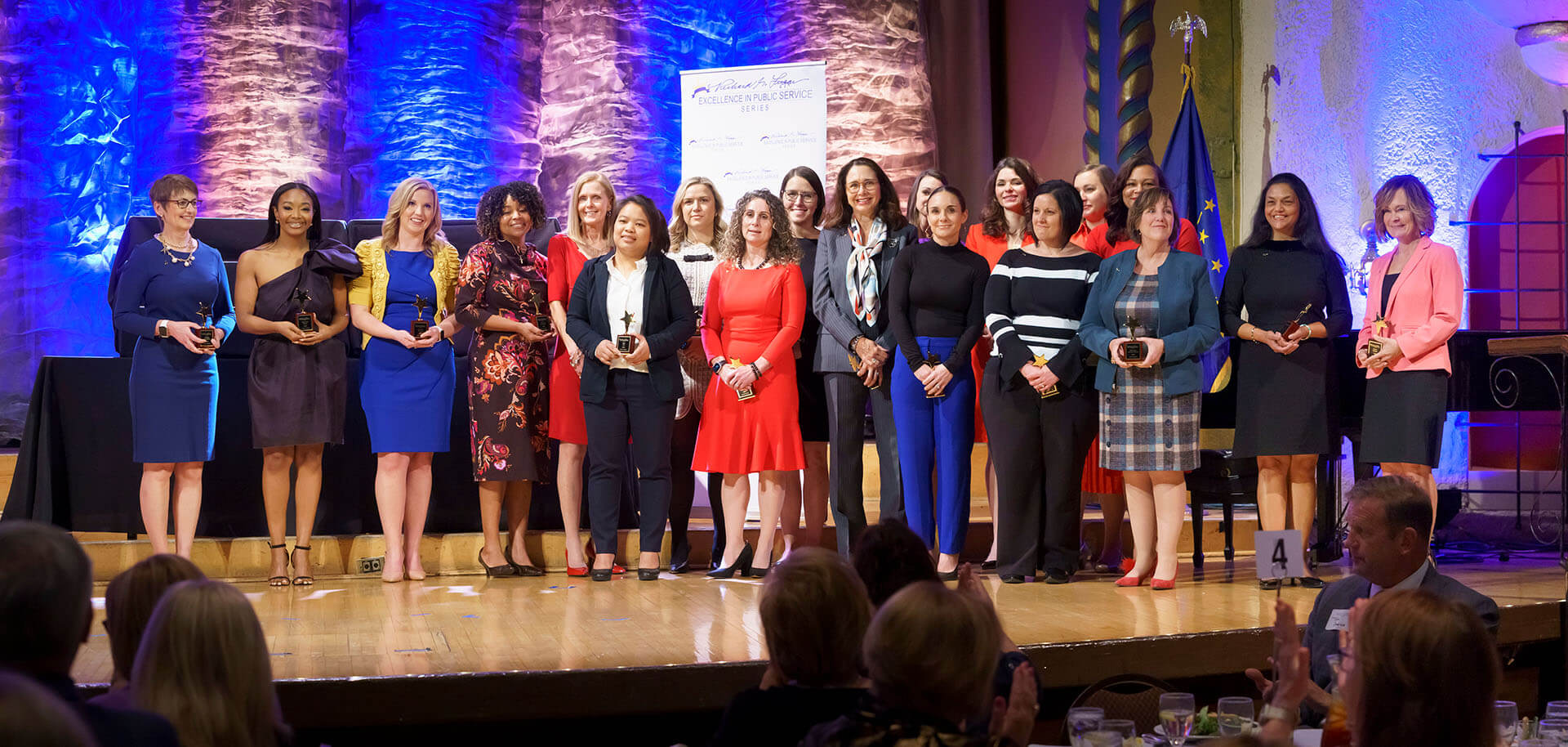 Lugar Series members are recognized on stage