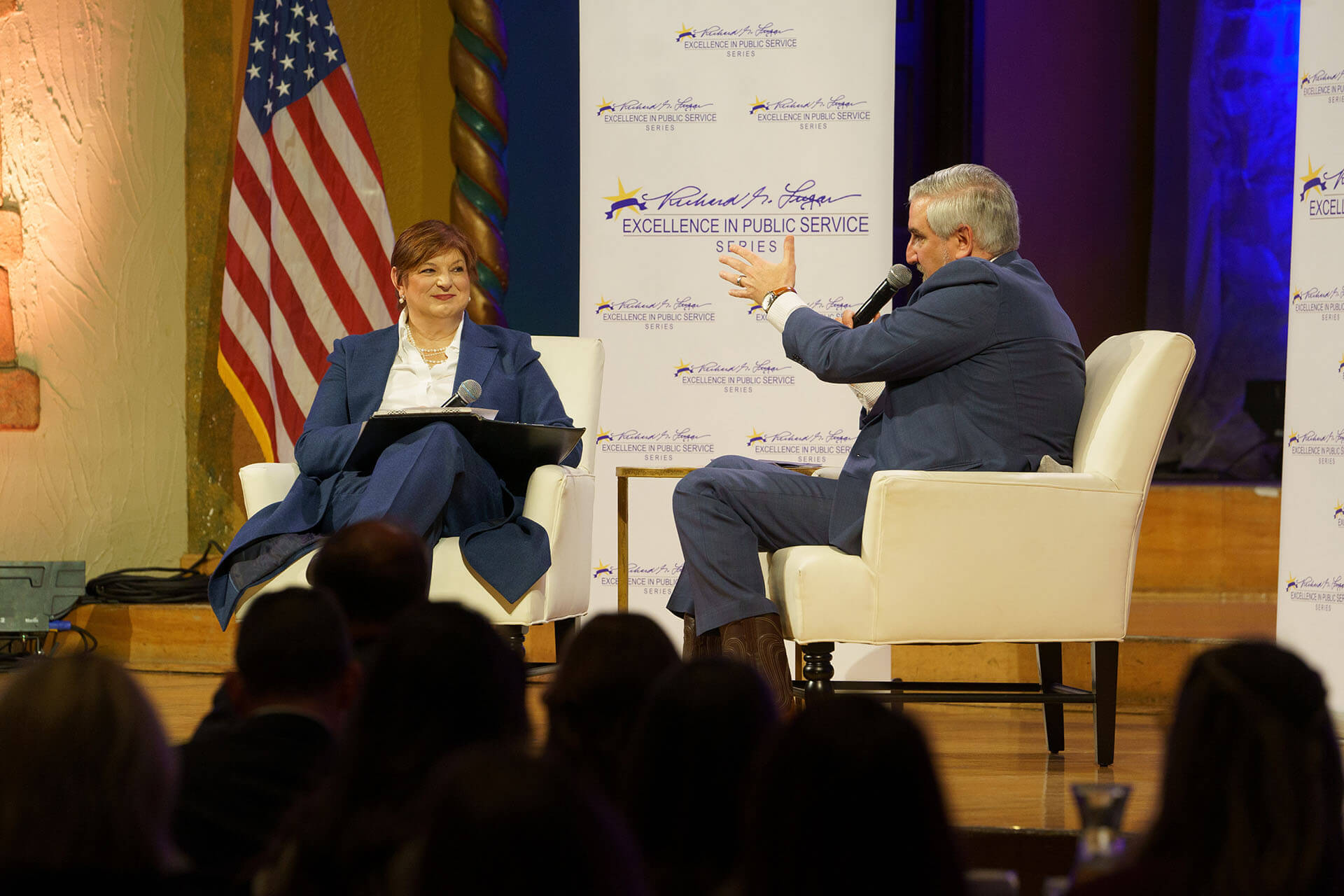 Lugar Series Annual Luncheon guest speaker answers a question