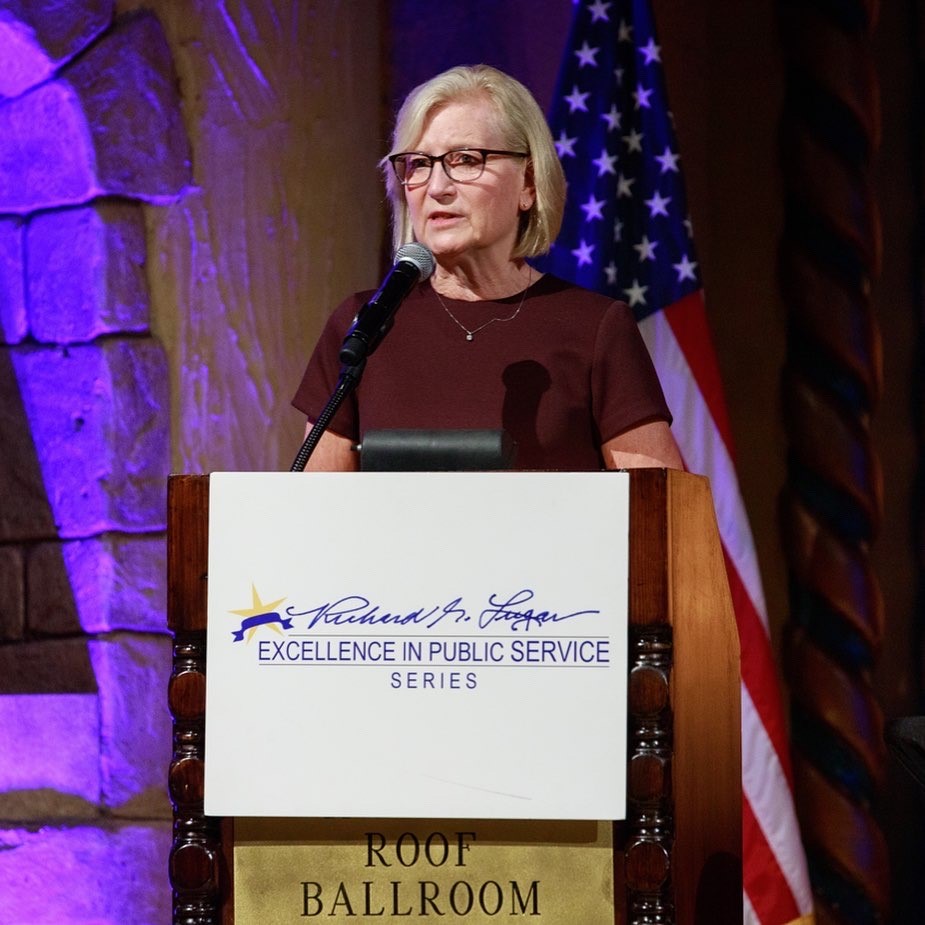 Woman speaks at Excellence in Public Service Series