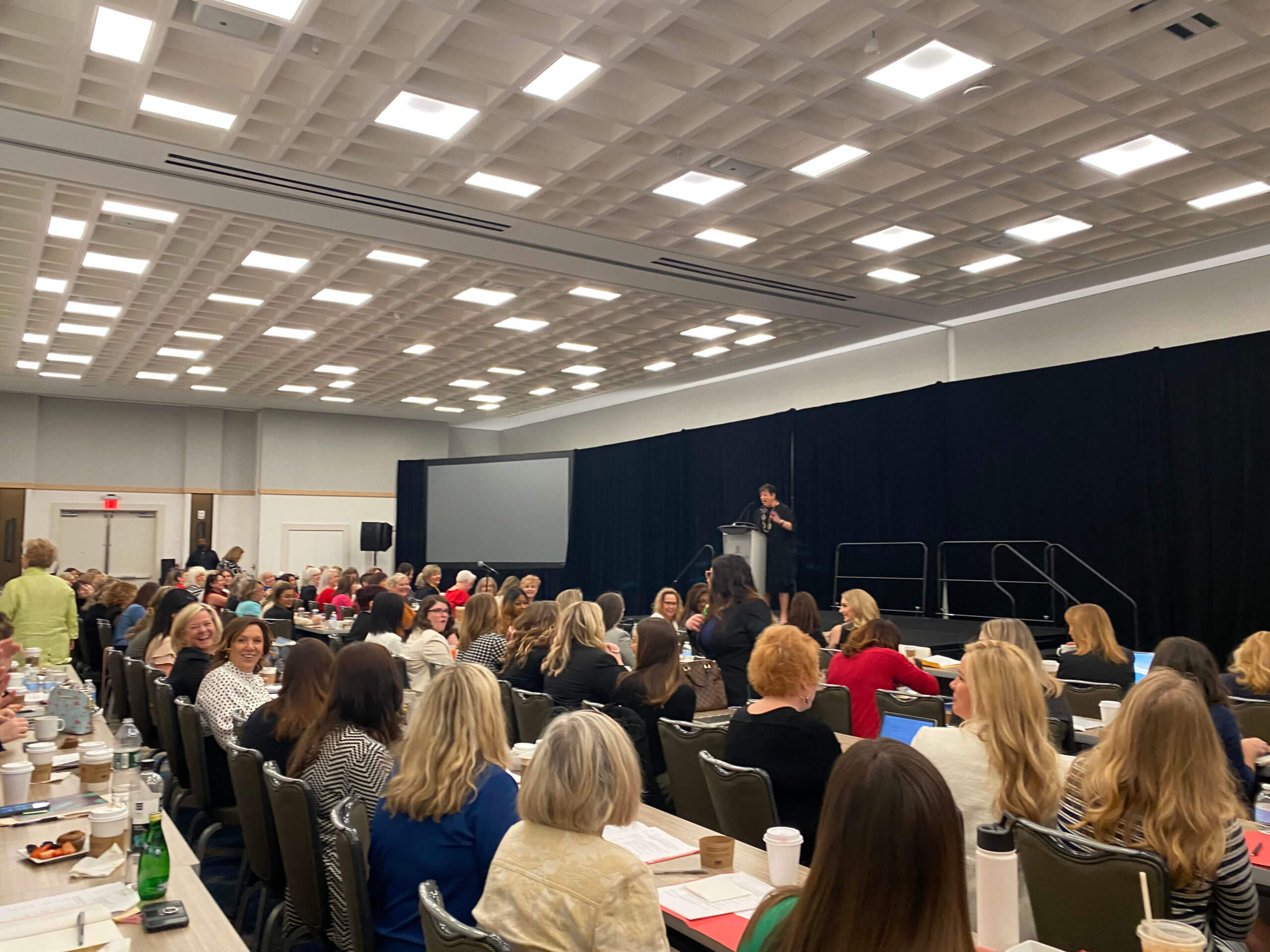 Lugar Series group attending conference